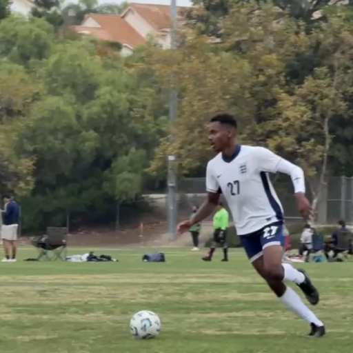 MANNY  PLAYS SOCCER